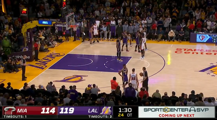  巴特勒三双热火加时险胜尼克斯  